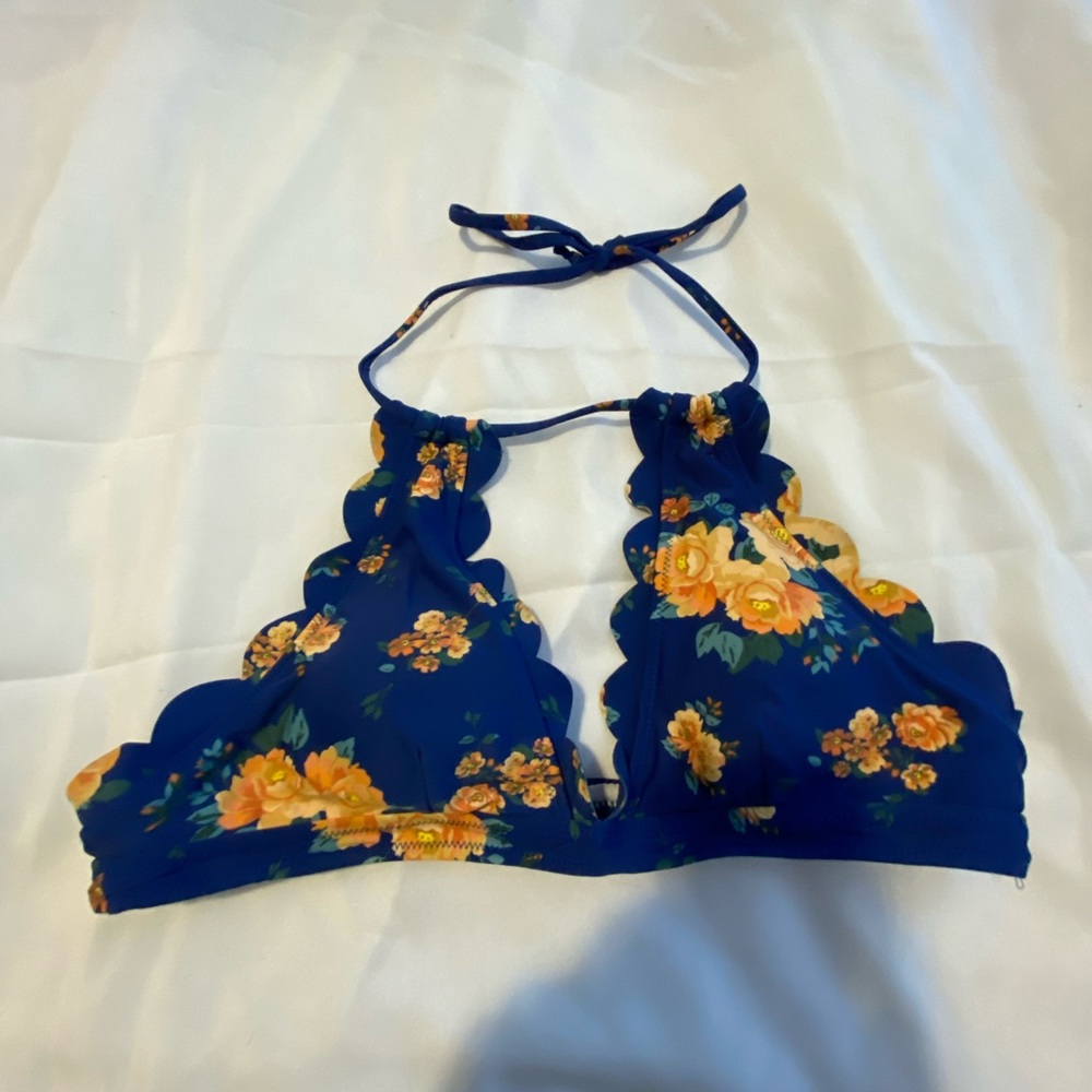 Floral patterned bathing suit top with matching bottoms! (See on my page)